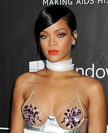 Rihanna covers up her nipples at amfAR LA Inspiration Gala in Hollywood