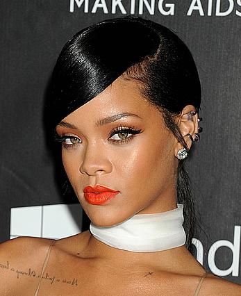 Rihanna covers up her nipples at amfAR LA Inspiration Gala in Hollywood