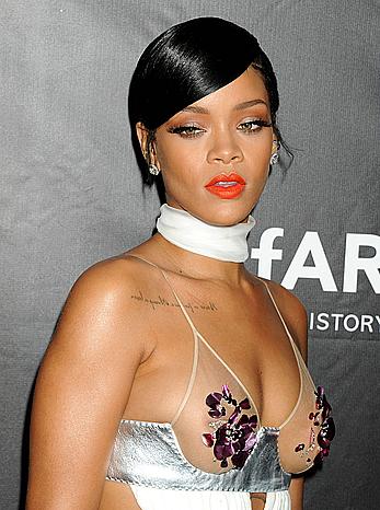 Rihanna covers up her nipples at amfAR LA Inspiration Gala in Hollywood