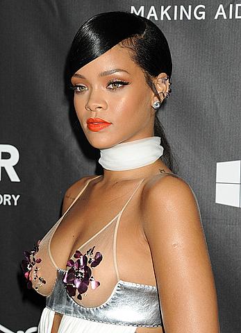 Rihanna covers up her nipples at amfAR LA Inspiration Gala in Hollywood