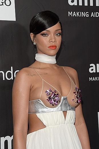 Rihanna covers up her nipples at amfAR LA Inspiration Gala in Hollywood