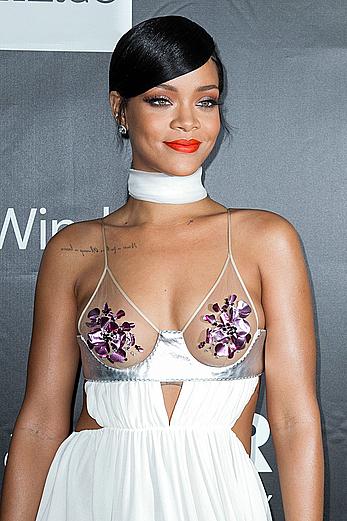 Rihanna covers up her nipples at amfAR LA Inspiration Gala in Hollywood