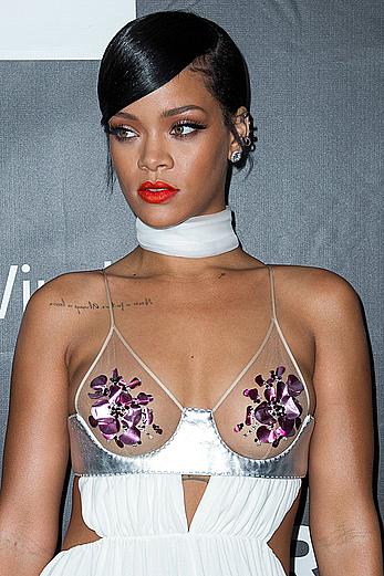 Rihanna covers up her nipples at amfAR LA Inspiration Gala in Hollywood