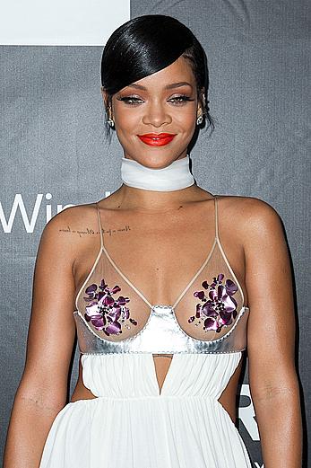 Rihanna covers up her nipples at amfAR LA Inspiration Gala in Hollywood