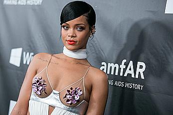 Rihanna covers up her nipples at amfAR LA Inspiration Gala in Hollywood