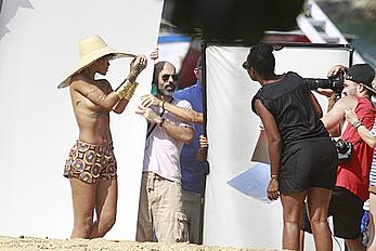 Rihanna topless with pasties during photoshoot in Brasil