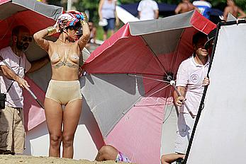 Rihanna topless with pasties during photoshoot in Brasil