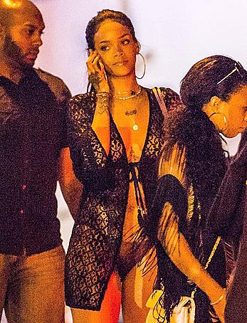 Rihanna nude tits under see through caftan as she boards at yacht in St. Barts