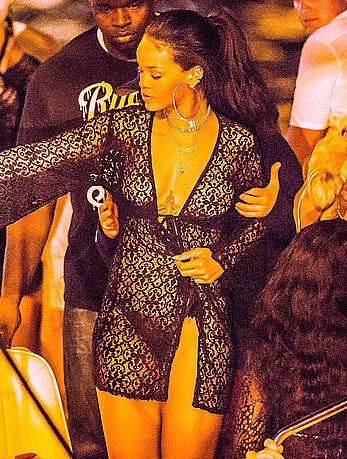 Rihanna nude tits under see through caftan as she boards at yacht in St. Barts