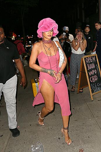 Rihanna braless in a see throught dress out at night in New York