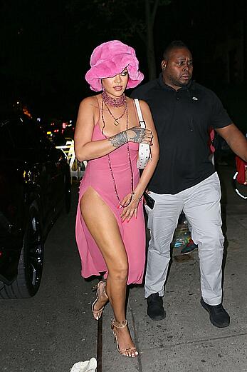 Rihanna braless in a see throught dress out at night in New York