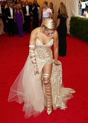 Rita Ora legs and cleavage at 2014 Met Gala in NY