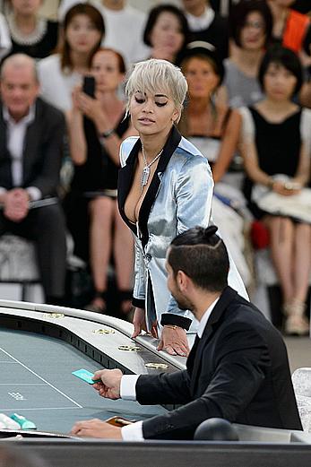 Rita Ora nipslip and cleavage at Chanel fashion show at Fashion Week