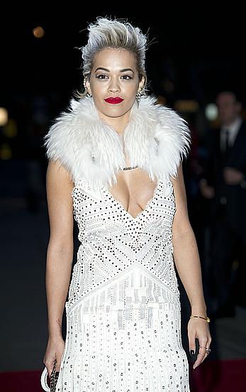 Rita Ora slight cleavage at The Glamour Of Italian Fashion Private Dinner in London