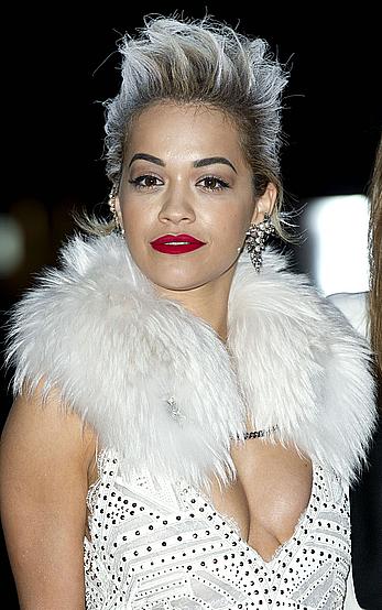 Rita Ora slight cleavage at The Glamour Of Italian Fashion Private Dinner in London