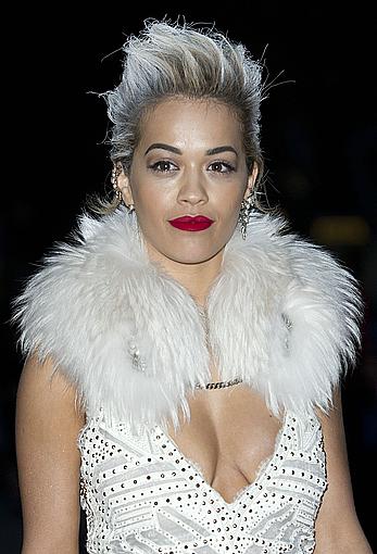 Rita Ora slight cleavage at The Glamour Of Italian Fashion Private Dinner in London