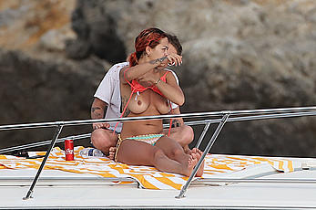 Rita Ora topless on a yacht in Tuscany