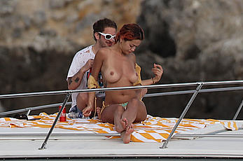 Rita Ora topless on a yacht in Tuscany