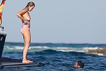 Rita Ora topless on a yacht in Formentera