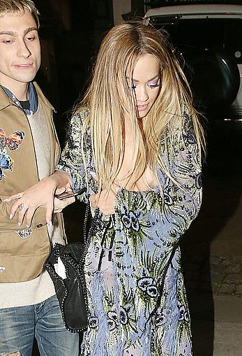 Rita Ora tit slip leaving X Factor studios in London