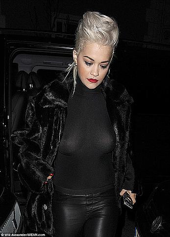 Rita Ora nude boobs under see through top after concert