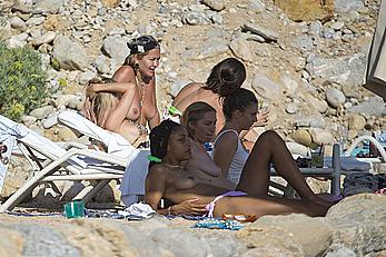 Rita Ora topless with friends on holiday in Ibiza