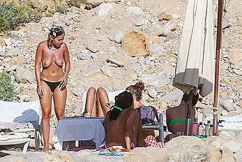 Rita Ora topless with friends on holiday in Ibiza