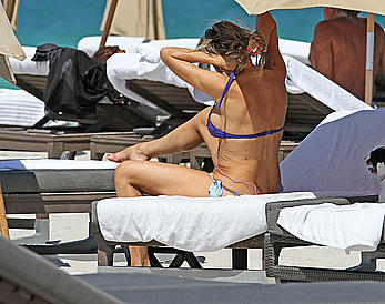 Rita Rusic boob slip in bikini at the beach in Miami