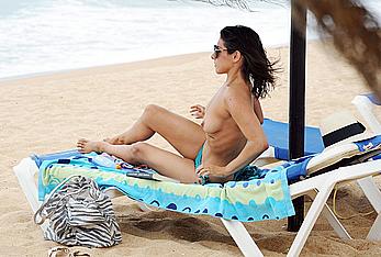 Roxanne Pallett sunbathing topless at the beach in Cyprus