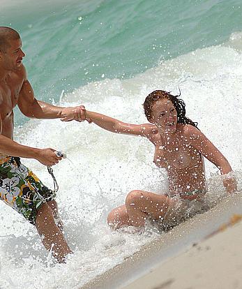 Natasha Hamilton from Atomic Kitten topless on the beach paparazzi shots