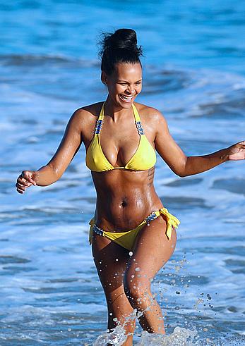 Samantha Mumba sexy in yellow bikini candids