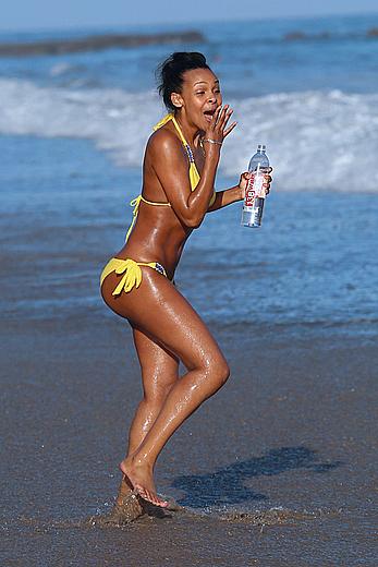 Samantha Mumba sexy in yellow bikini candids