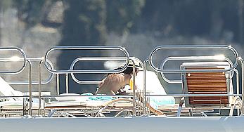 Sara Sampaio tanning topless on a yacht in St. Tropez