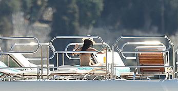 Sara Sampaio tanning topless on a yacht in St. Tropez