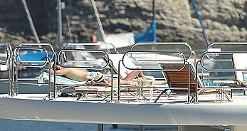 Sara Sampaio tanning topless on a yacht in St. Tropez