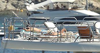 Sara Sampaio tanning topless on a yacht in St. Tropez