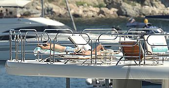 Sara Sampaio tanning topless on a yacht in St. Tropez