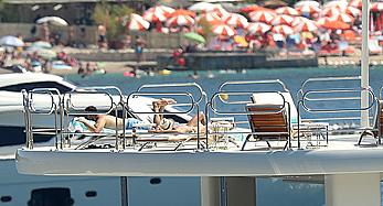 Sara Sampaio tanning topless on a yacht in St. Tropez