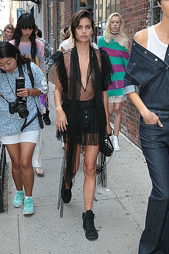 Sara Sampaio wears a see through black dress at the Zadig & Voltaire SpringSummer 2018