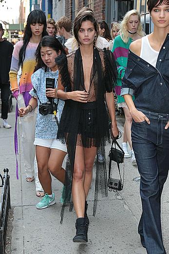 Sara Sampaio wears a see through black dress at the Zadig & Voltaire SpringSummer 2018