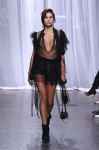 Sara Sampaio wears a see through black dress at the Zadig & Voltaire SpringSummer 2018