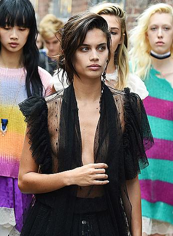 Sara Sampaio wears a see through black dress at the Zadig & Voltaire SpringSummer 2018