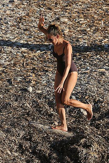 Sarah Jessica Parker in a swimsuit on a beach & yacht in Ibiza