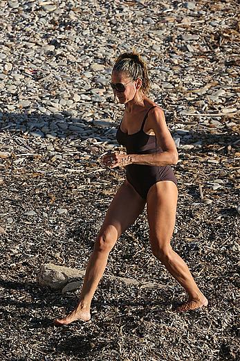 Sarah Jessica Parker in a swimsuit on a beach & yacht in Ibiza