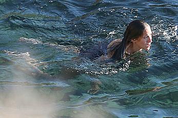 Sarah Jessica Parker in a swimsuit on a beach & yacht in Ibiza