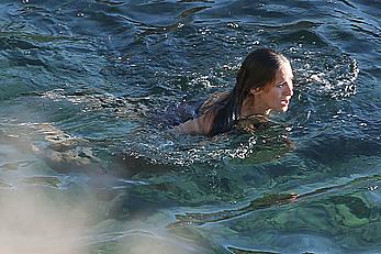 Sarah Jessica Parker in a swimsuit on a beach & yacht in Ibiza