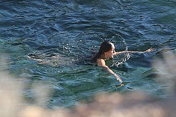 Sarah Jessica Parker in a swimsuit on a beach & yacht in Ibiza