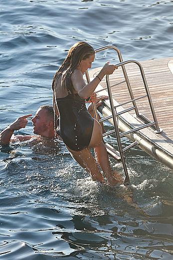 Sarah Jessica Parker in a swimsuit on a beach & yacht in Ibiza