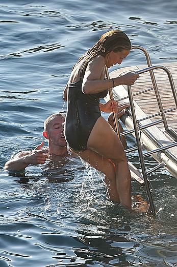 Sarah Jessica Parker in a swimsuit on a beach & yacht in Ibiza