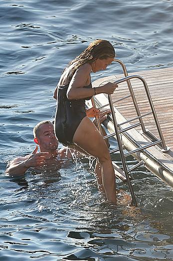 Sarah Jessica Parker in a swimsuit on a beach & yacht in Ibiza